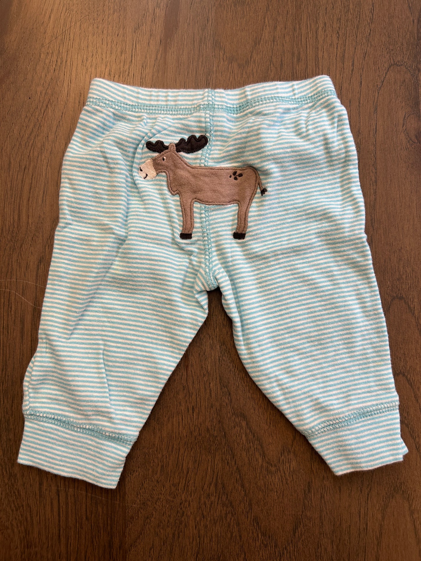Lot of Carter’s two onesies, four pants, boy, size 3 months