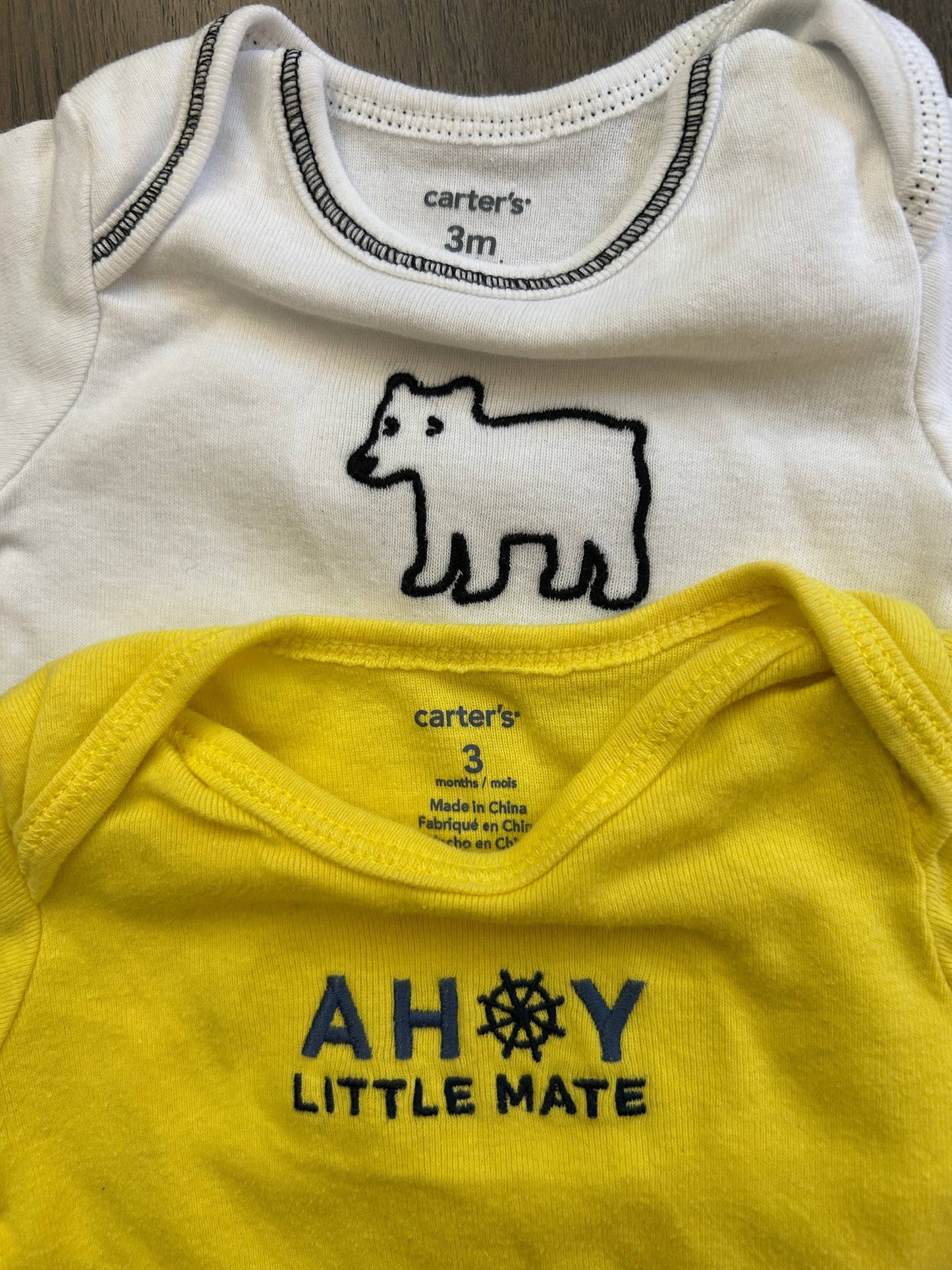 Lot of Carter’s two onesies, four pants, boy, size 3 months